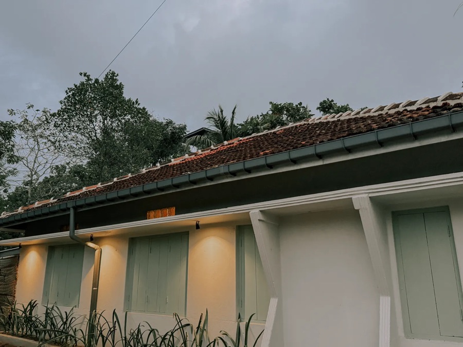 Garden exterior of Kickin' Surf Lodge in Weligama